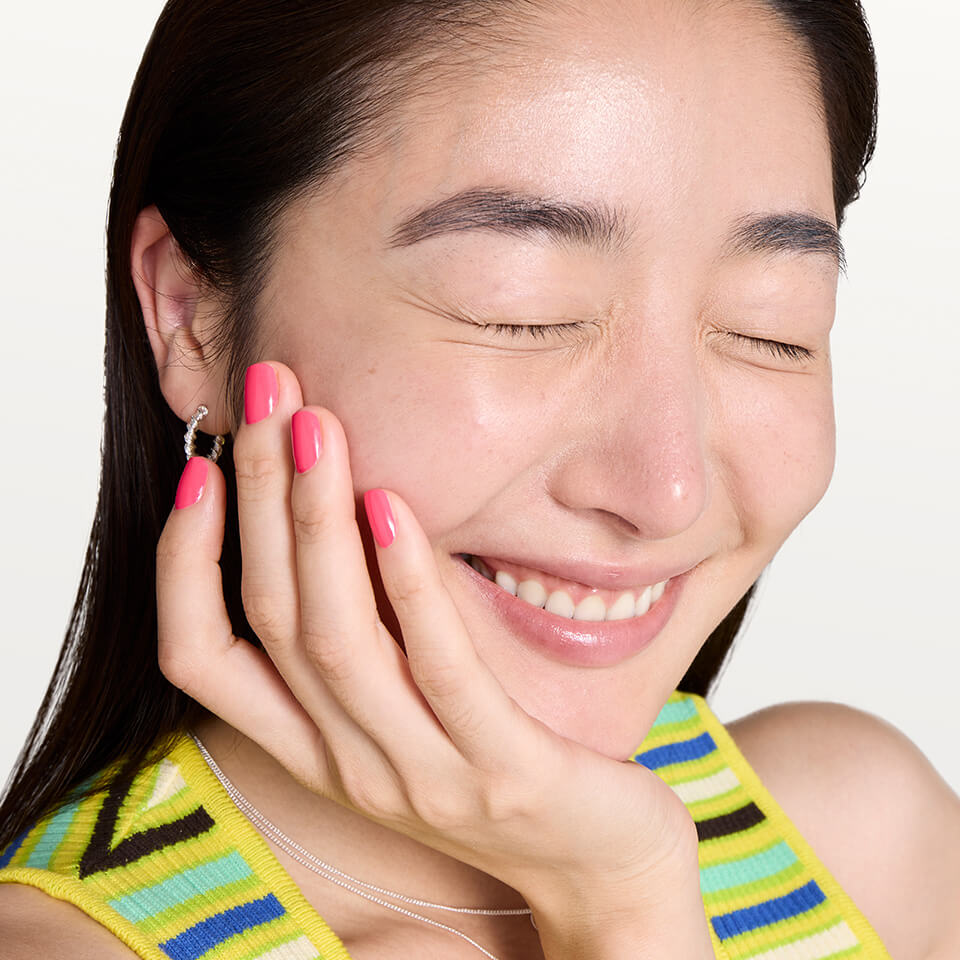 A close-up of a person smiling